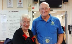 Deidre Earl presents the Stuart Earl Memorial Trophy to James Slinn, President Bexhill RC